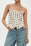 Crisscross Ruffled Hem Polka Dot Cami